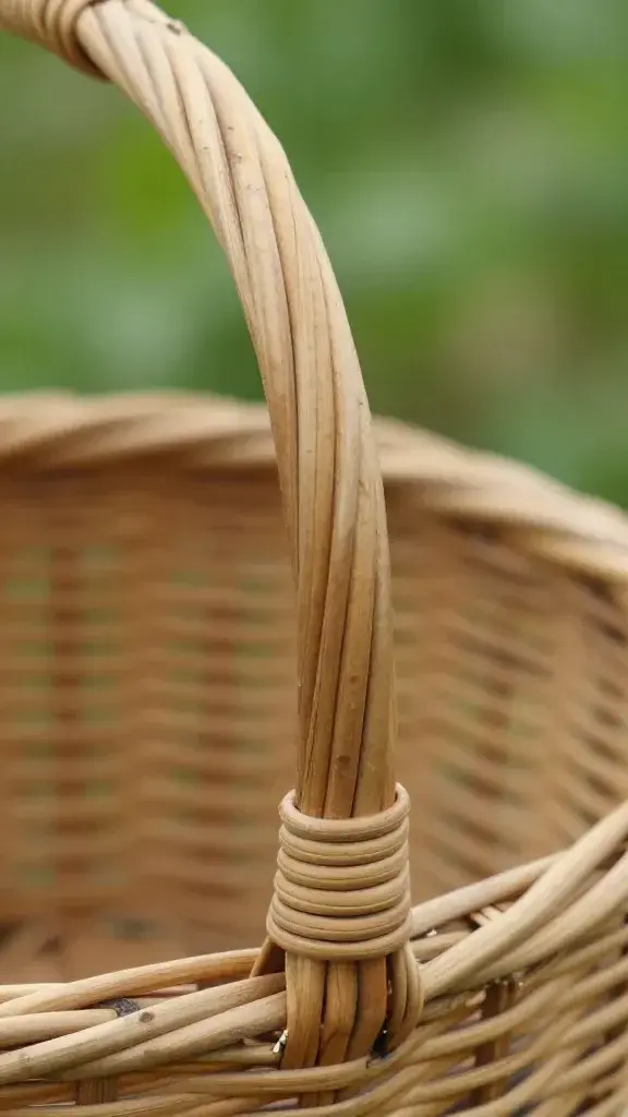 Closeup of a sturdy handheld basket handle grip on harvest